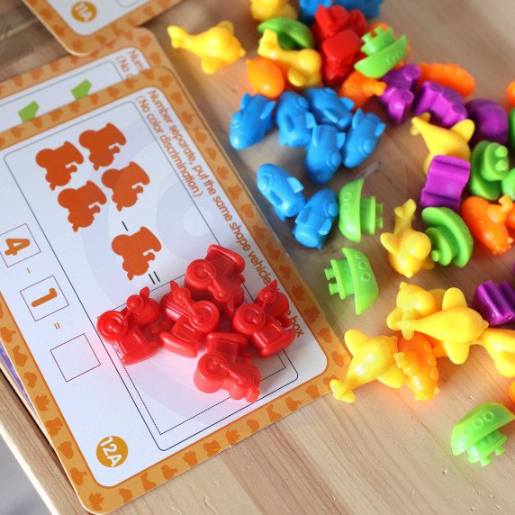 WOOPIE Montessori mokomasis rinkinys skaičiuoti, rūšiuoti spalvas, transporto priemonės 83 vnt.