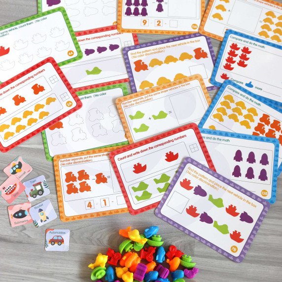 WOOPIE Montessori mokomasis rinkinys skaičiuoti, rūšiuoti spalvas, transporto priemonės 83 vnt.
