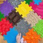 WOOPIE ortopedinis pojūčių kilimėlis „Royal Puzzle“ su 26 dėlionėmis + 4 mažomis.